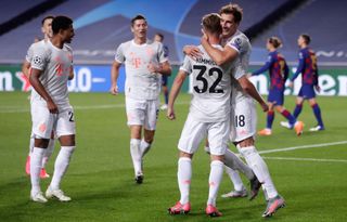 Joshua Kimmich celebrates with his Bayern Munich team-mates after scoring against Barcelona in the Champions League in August 2020.