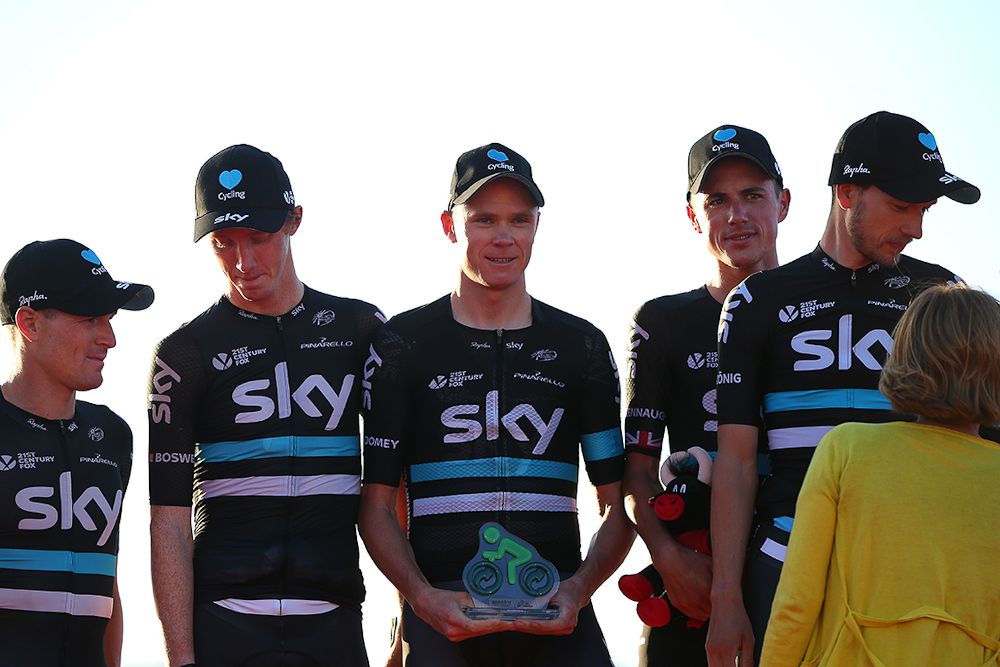 Team Sky riders celebrate on the Vuelta's stage 1 podium.