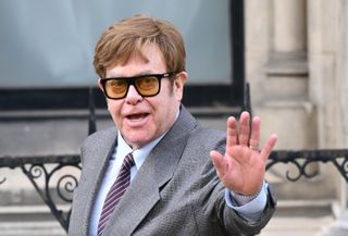 a close up of musician Sir Elton John leaving London's High Court in March 2023.