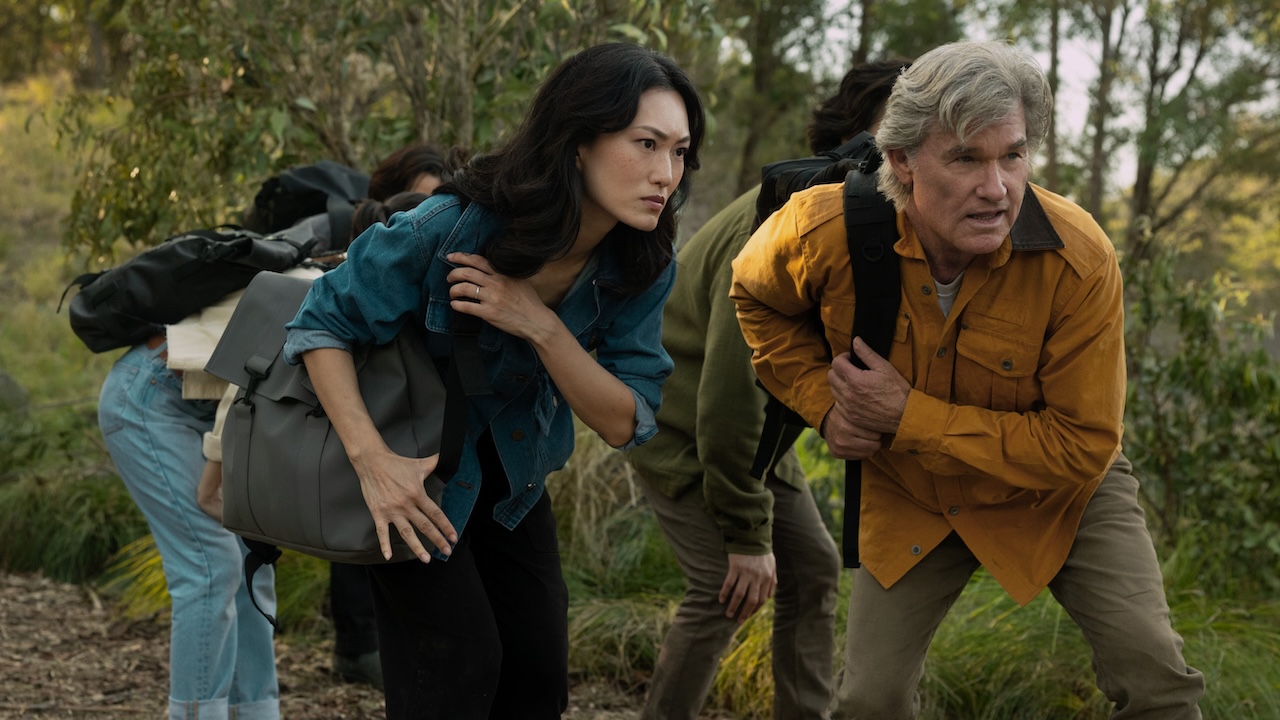 Keiko slightly crouched down next to Lee Shaw in Monarch: Legacy of Monsters Season 2