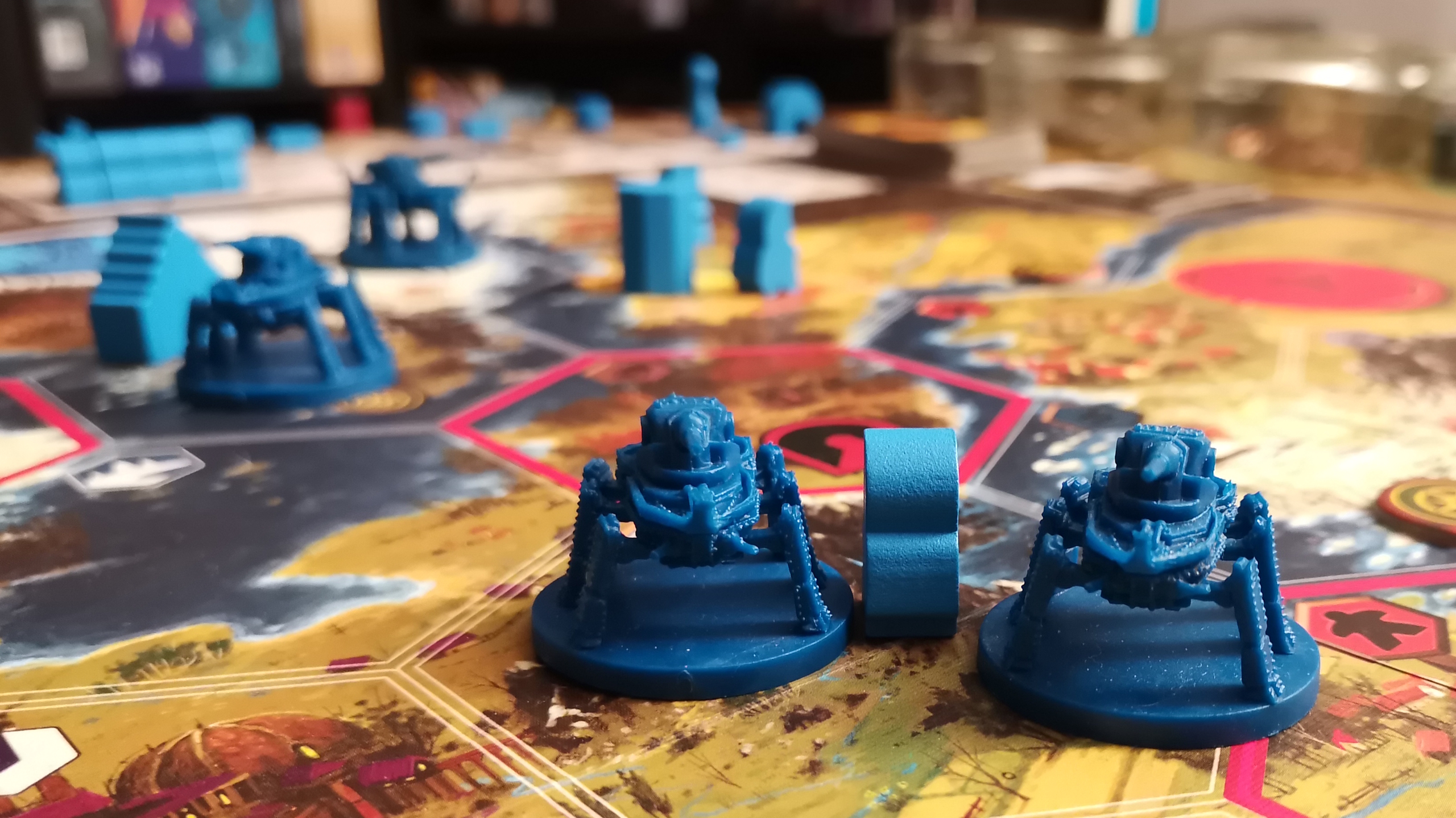 Scythe tokens on the board