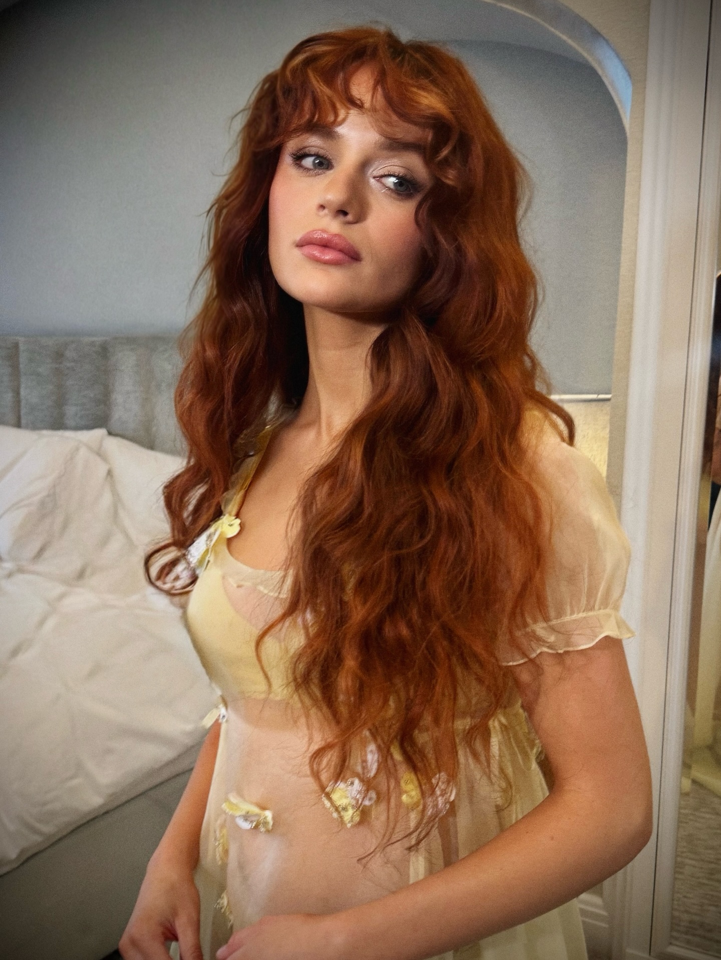 Image of Joey King with toasted copper hair.