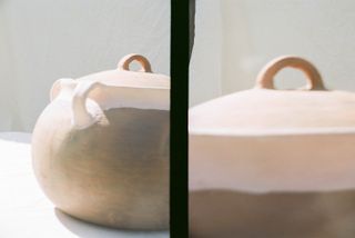 Brown ceramic pot-like object on a grey concrete surface, captured on a sunny day; RIGHT: Photographed upclose; LEFT: Photographed at a slight distance