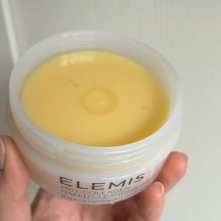 Laura holding Elemis Pro-Collagen Naked Cleansing Balm - best cleansers