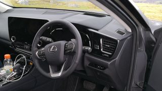 lexus nx 450h+ steering wheel and cabin