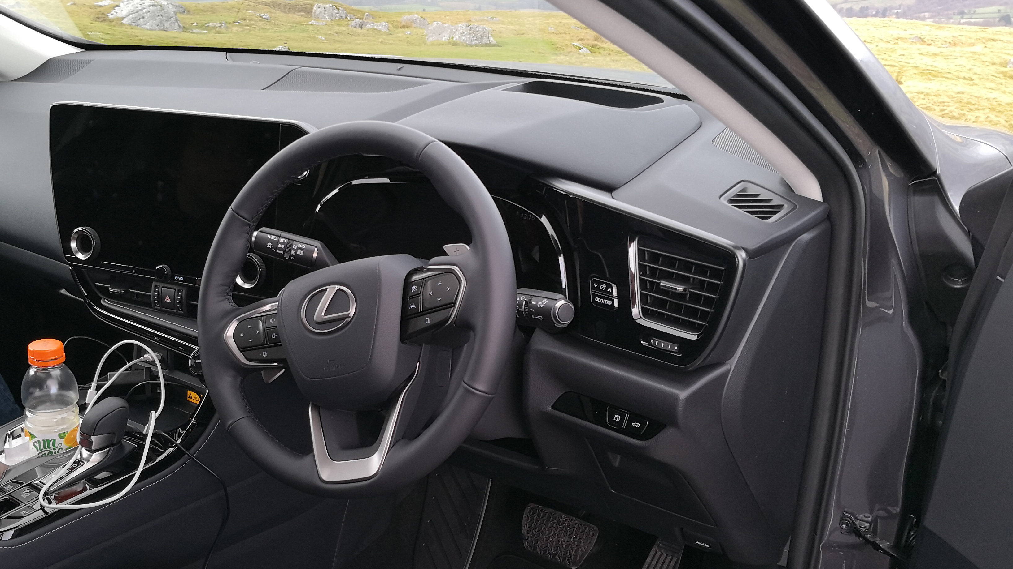 lexus nx 450h+ steering wheel and interior