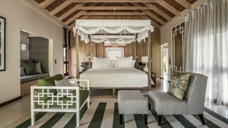 Bedroom at Four Seasons Desroches Island.