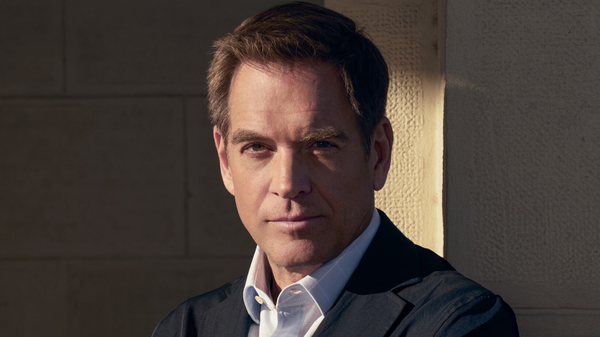 Michael Weatherly posing for the camera ahead of his big return to NCIS in the fall of 2026