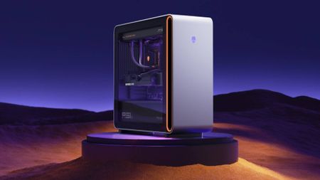 Alienware Area-51 on circular base with night desert backdrop.