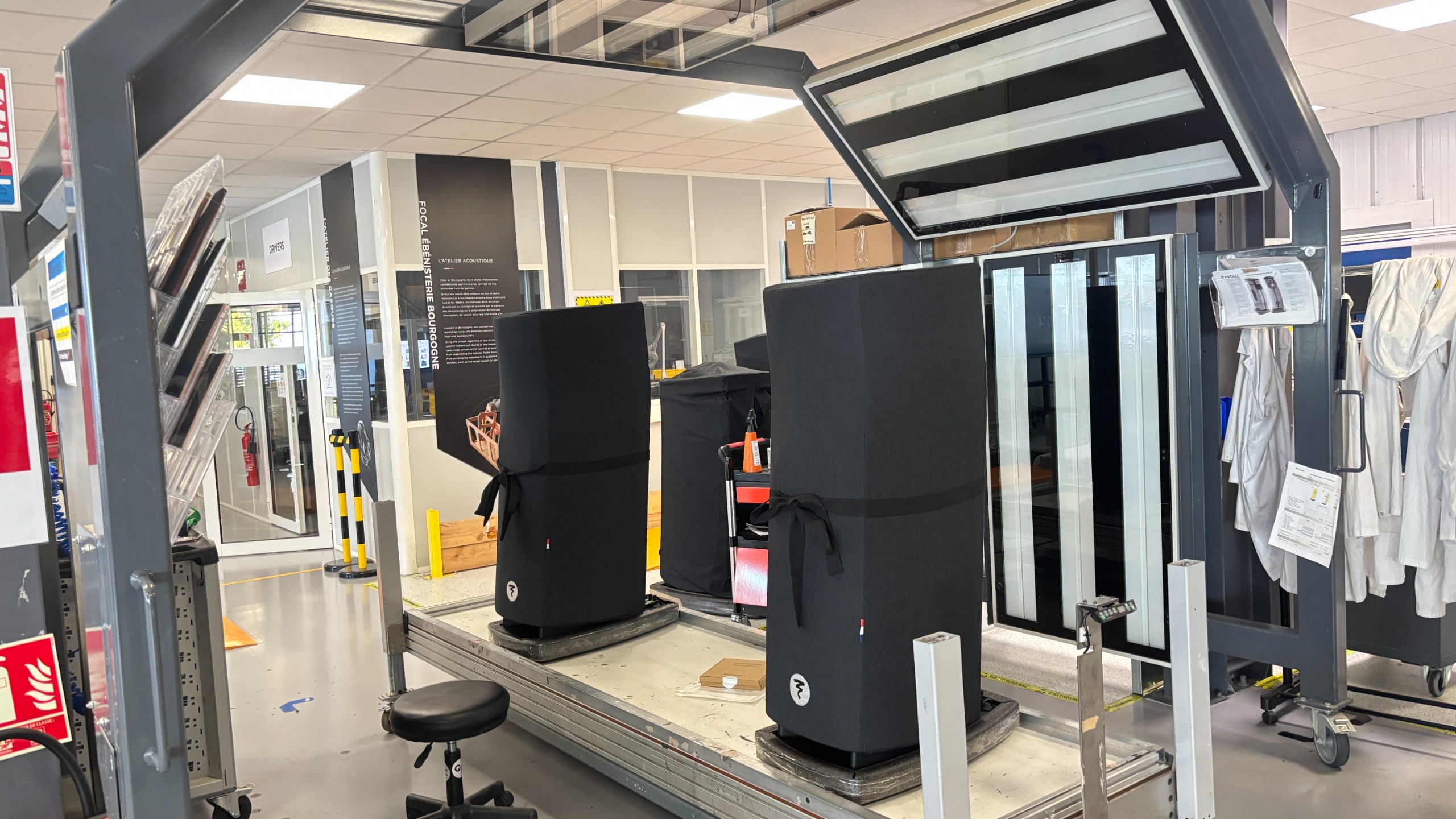 Focal speakers under cloth wraps being tested in a light machine