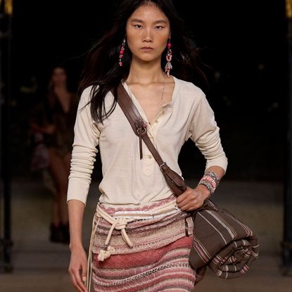 woman wearing a crossbody bag on the fall 2026 runway of isabel marant 
