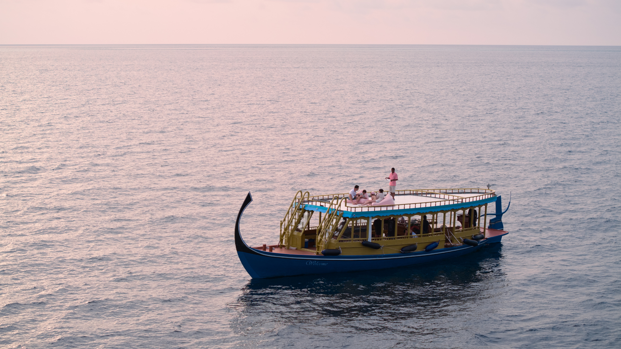 A shot of the sunset cruise boat in the middle of the Indian Ocean