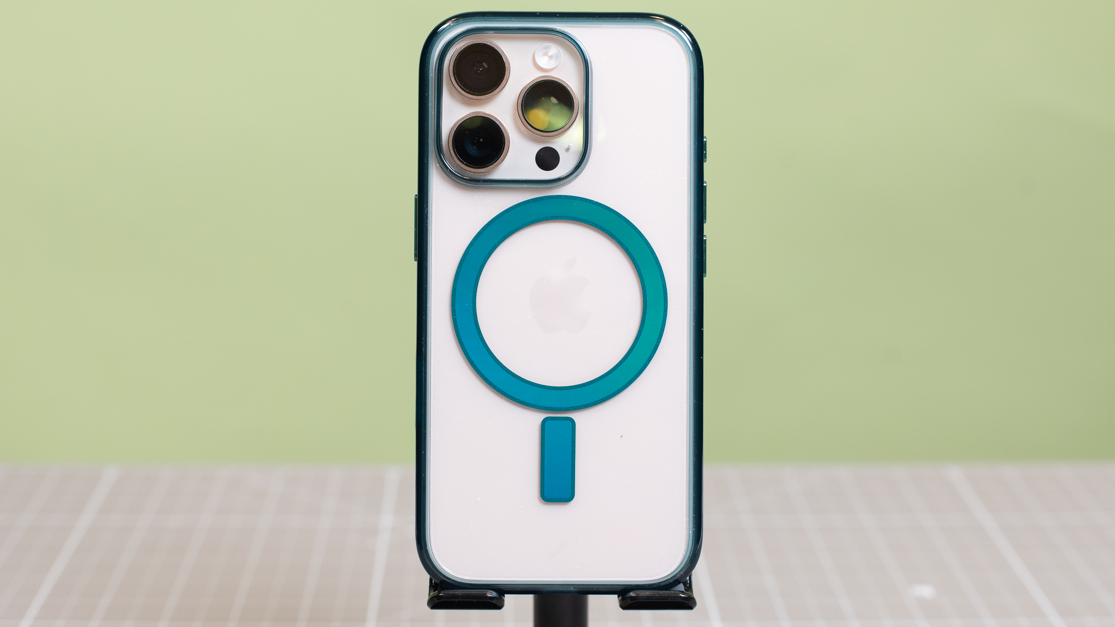 Otterbox Lumen Series from back showing blue MagSafe magnets and iPhone 16 Pro in desert titanium