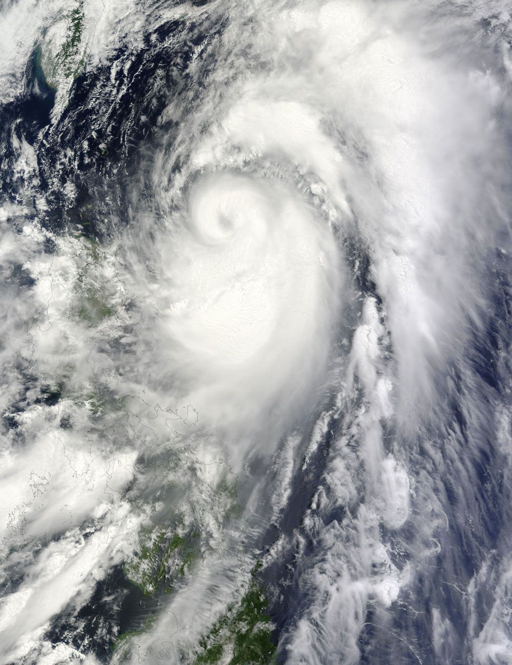 Typhoon Mawar was spotted churning over the Philippine Sea by a NASA satellite June 3.