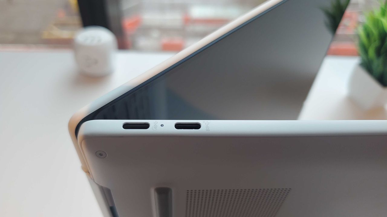white laptop on table