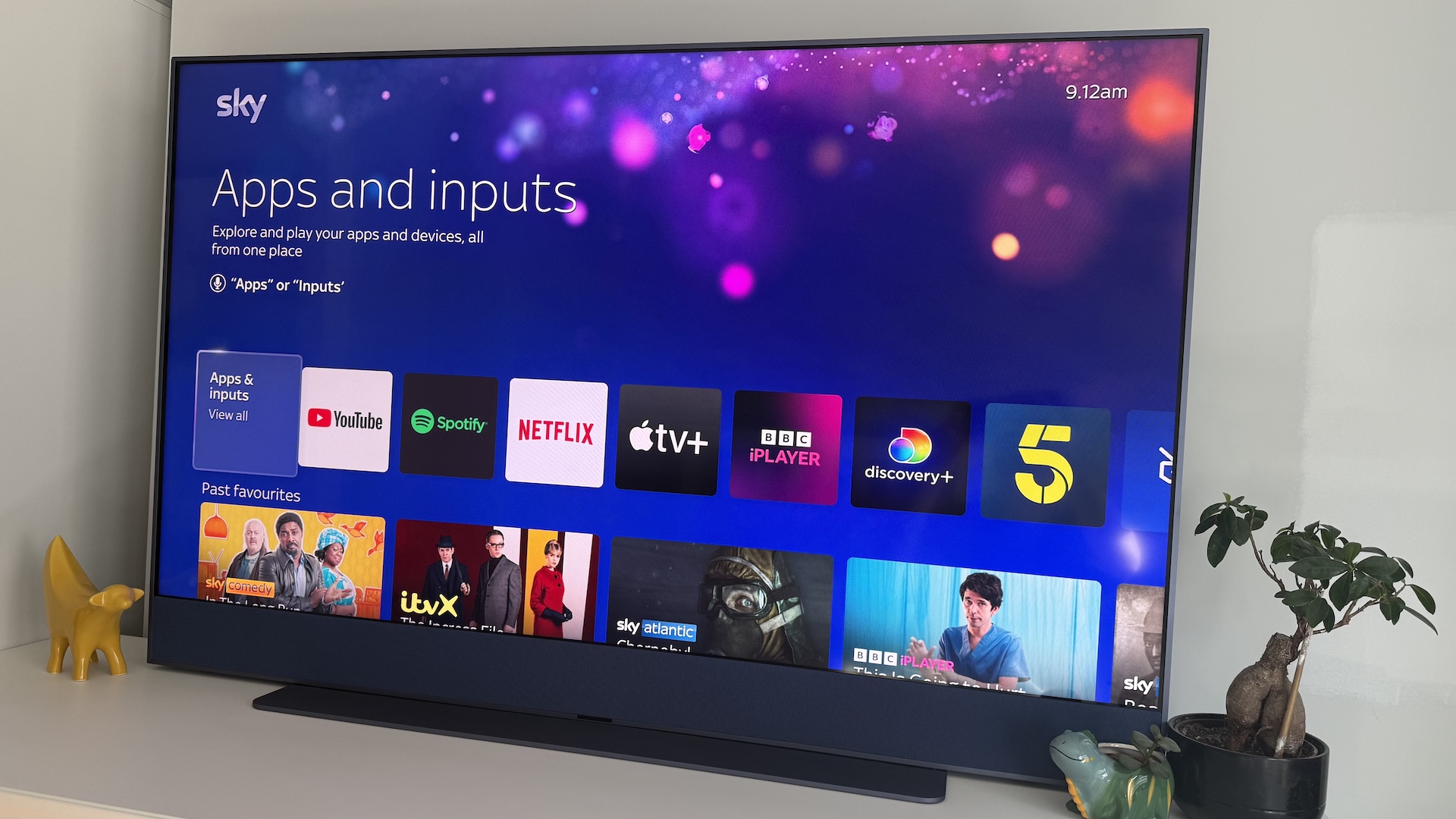 The Sky Glass Gen 2 screen on a white cabinet