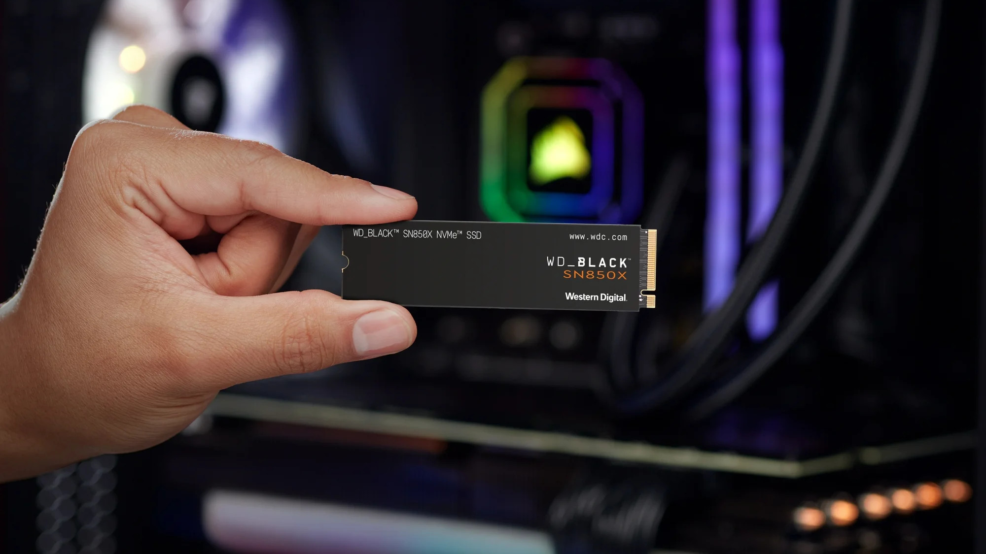 WD Black SN850X SSD held in a hand