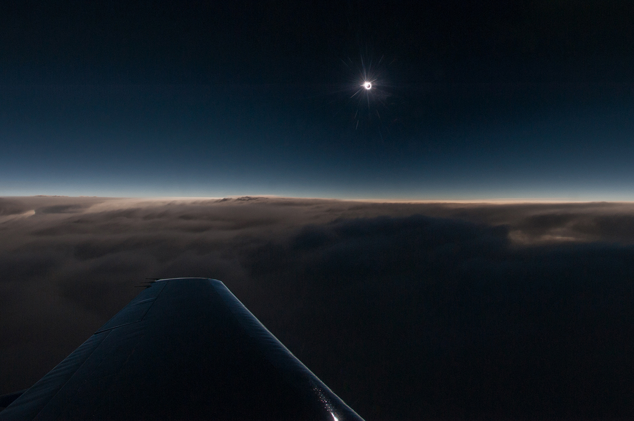 Chasing a Solar Eclipse: Wing of Dassault Falcon Jet 