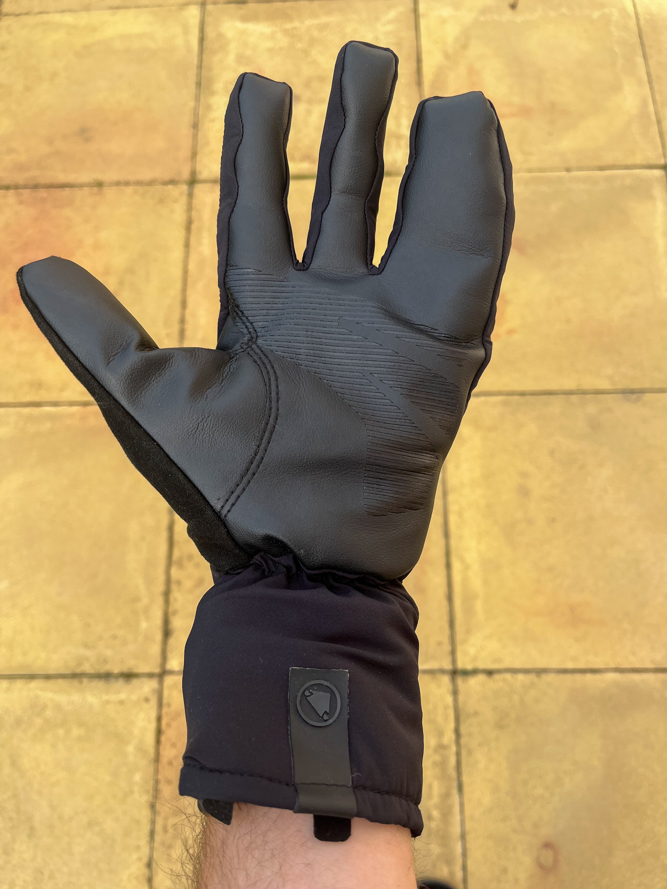 A black cycling lobster glove