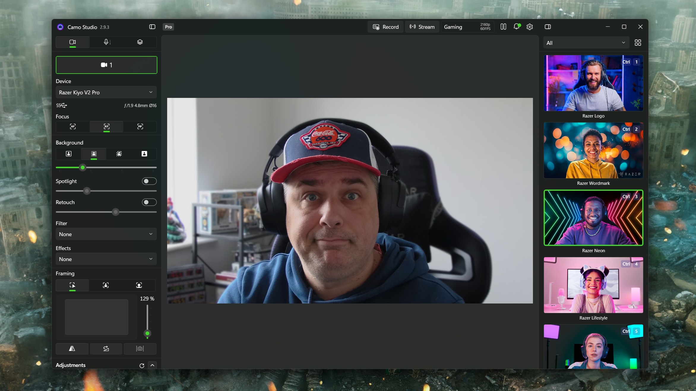 A screenshot of the Camo Studio app using the Razer Kiyo V2 Pro webcam with settings panel open on the left and special Razer backgrounds on the right.