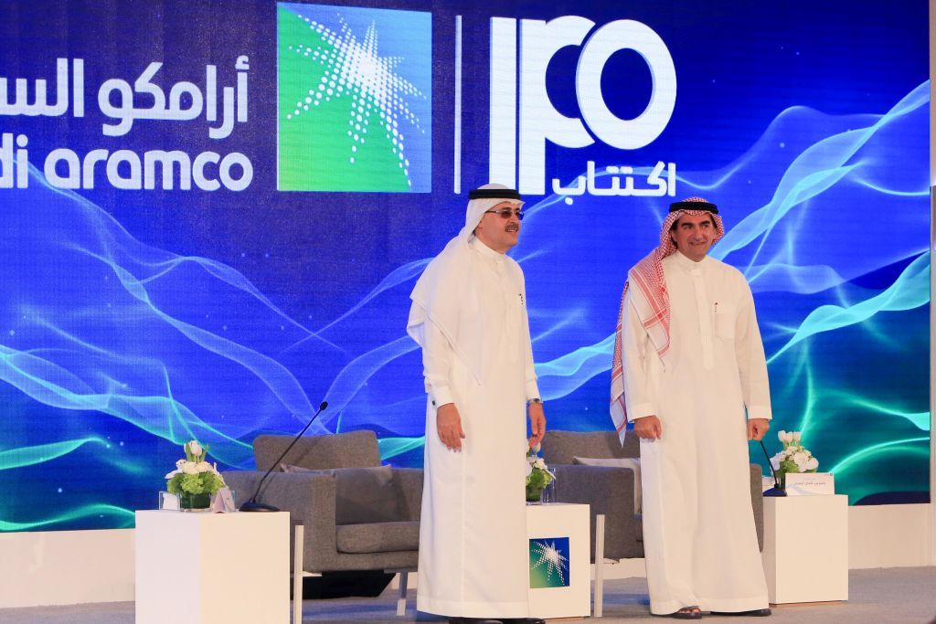 President and CEO of Saudi Aramco Amin Nasser (L) and Aramco&amp;#039;s chairman Yasir al-Rumayyan