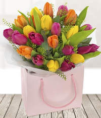 Save up to £15 and grab free chocolates with hand-delivered Mother's Day flowers at