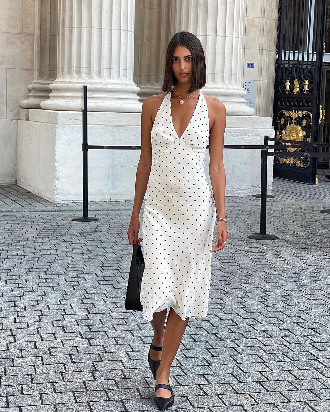 @salome.mory wears a Polka-dot dress and ballet flats