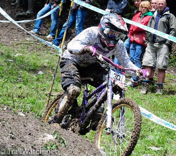 Jacqueline Harmony making her way down the muddy Champ&eacute;ry course.