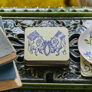 coaster with floral dishes and books