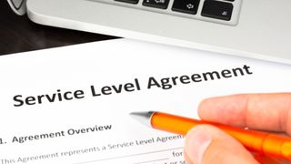 Service Level Agreement Contract Form with Hand and Pen