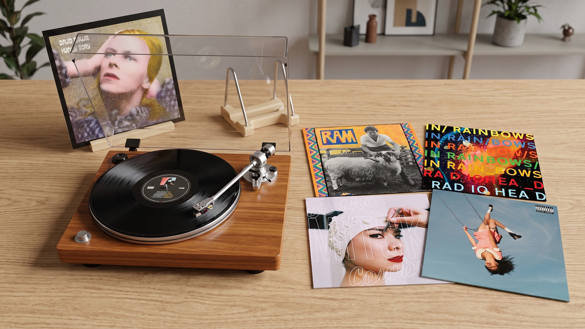 A selection of vinyl records and a turntable