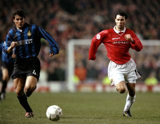 Manchester United's Ryan Giggs in a race for the ball with Inter's Javier Zanetti in 1999.