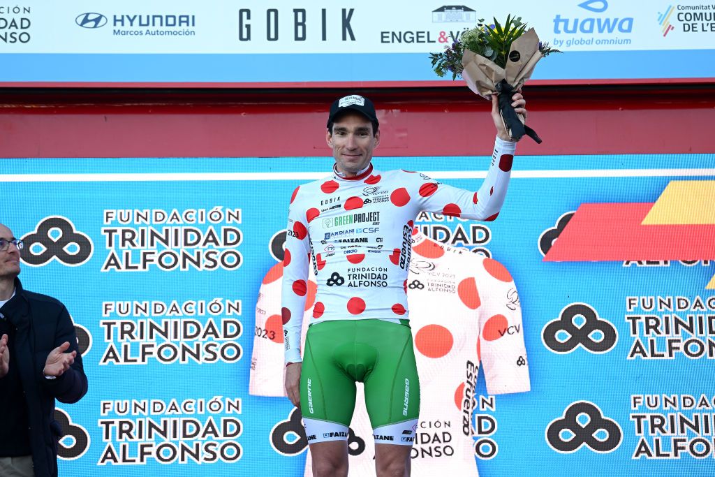ALTURA SPAIN FEBRUARY 04 Samuele Zoccarato of Italy and Team Green Project Bardiani CSF Faizan Polka dot Mountain Jersey celebrates at podium during the 74th Volta a la Comunitat Valenciana 2023 Stage 4 a 1816km stage from Burriana to Alto de la Cueva Santa Altura 832m VCV2023 VoltaValenciana on February 04 2023 in Altura Spain Photo by Dario BelingheriGetty Images