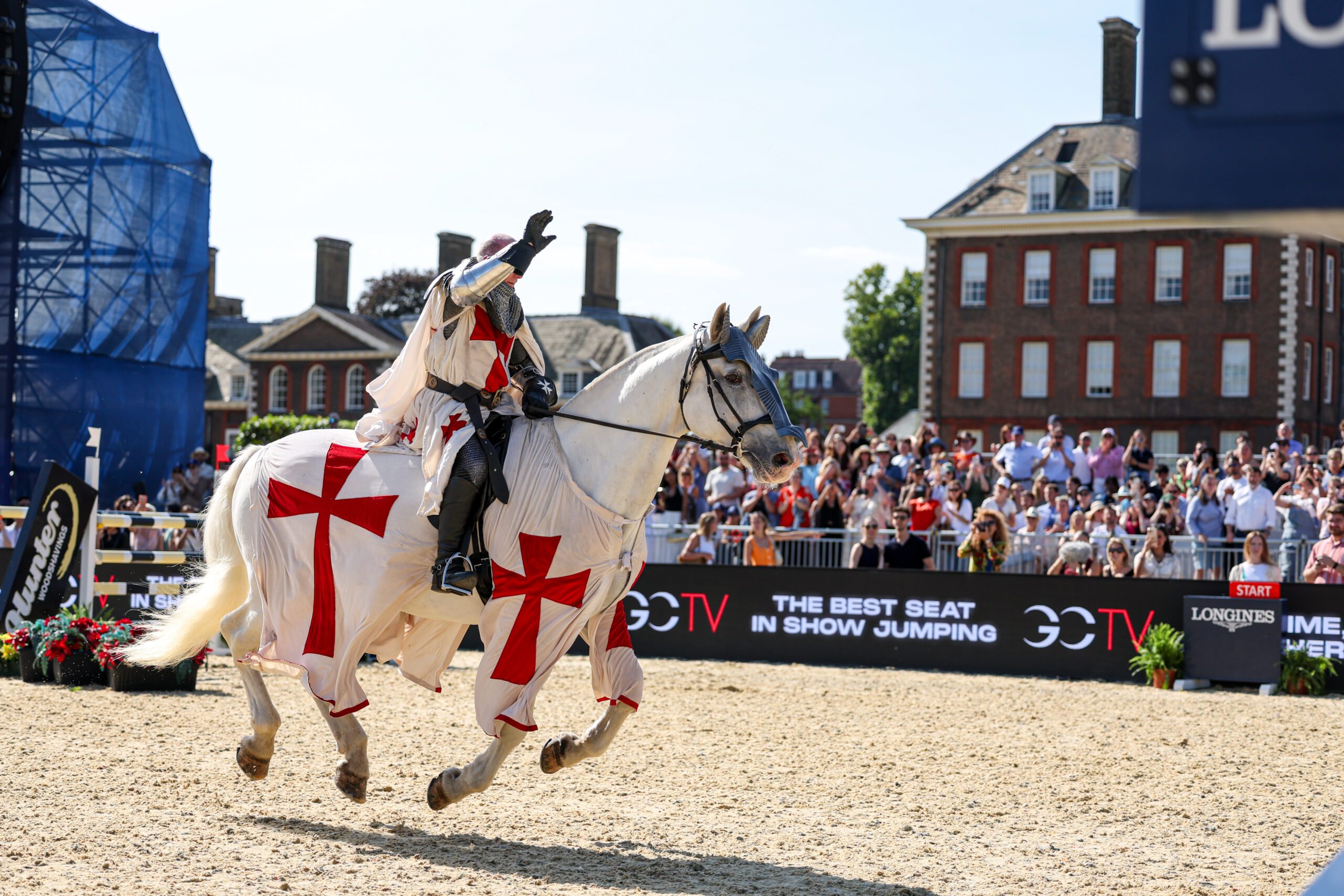 John Whitaker dressed as a knight in shining armour to celebrate his 70th birthday at the Longines Global Champions Tour of London 2025.