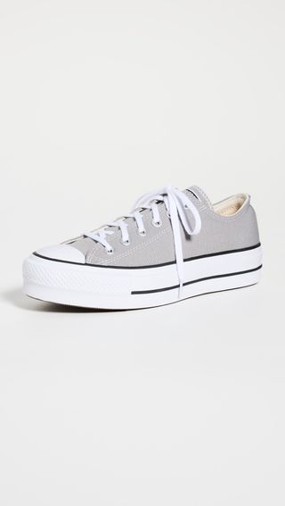 gray Converse sneakers with a chunky platform sole