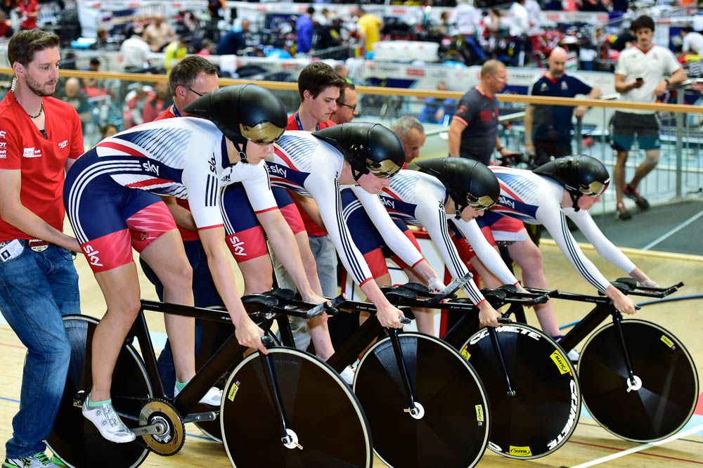The women's team pursuit riders get ready for the gun