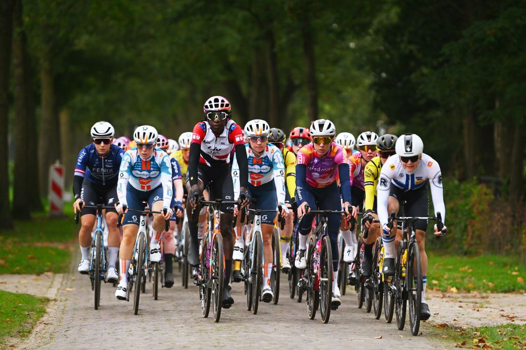 DOETINCHEM NETHERLANDS OCTOBER 12 LR Teniel Campbell of Trinidad and Tobago and Team Liv AlUla Jayco Red Most Combative Jersey Christine Majerus of Luxembourg and Team SD Worx Protime and Anniina Ahtosalo of Filand and Team UnoX Mobility lead the peloton during the 26th Simac Ladies Tour 2024 Stage 5 a 140km stage from Doetinchem to Doetinchem UCIWWT on October 12 2024 in Doetinchem Netherlands Photo by Luc ClaessenGetty Images