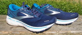 Pair of Brooks Ghost 14 running shoes, viewed from the side