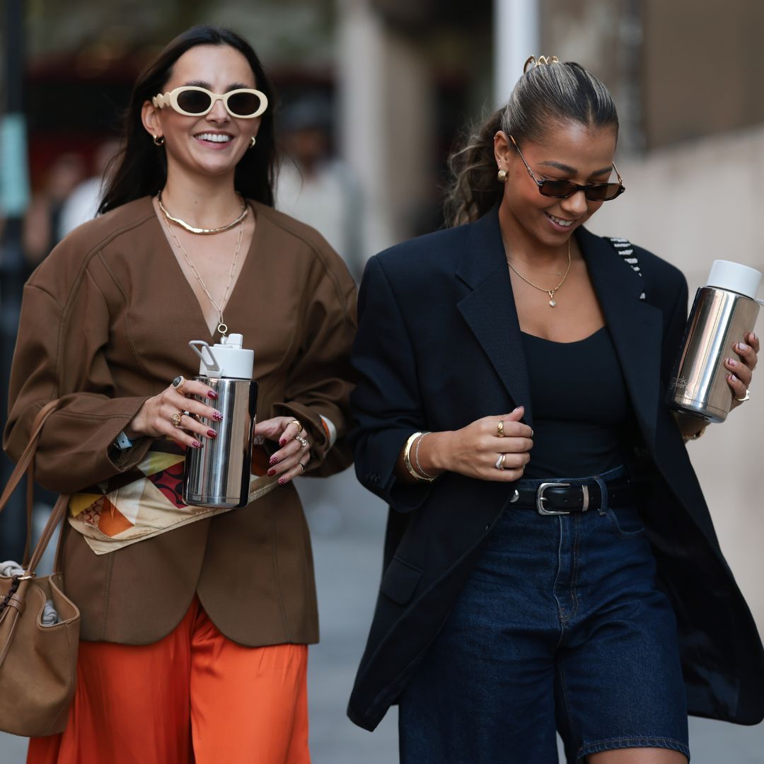 perfume for a job interview An image showing two women attending London Fashion Week 2025