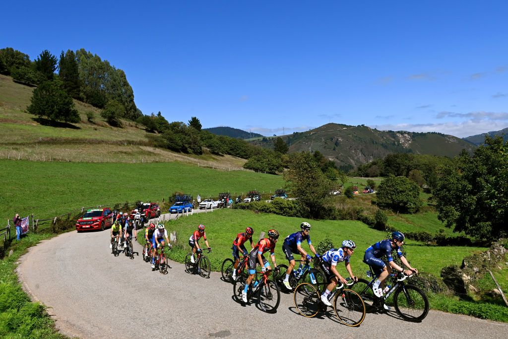 LACRUZDELINARES SPAIN SEPTEMBER 14 A general view of Remco Evenepoel of Belgium and Team Soudal Quick Step Polka dot Mountain Jersey Egan Bernal of Colombia and Team INEOS Grenadiers Damiano Caruso of Italy and and Team Bahrain Victorious Lewis Askey of The United Kingdom Lorenzo Germani of Italy and Team Groupama FDJ Nico Denz of Germany and Team BORA Hansgrohe Jarrad Drizners of Australia Andreas Kron of Denmark and Team Lotto Dstny Andrea Piccolo of Italy and Team EF EducationEasyPost Imanol Erviti of Spain and Movistar Team Max Poole of The United Kingdom and Team DSM firmenich Hugo Hofstetter of France and Team Arka Samsic and Paul Ourselin of France and Team TotalEnergies compete in the breakaway during the 78th Tour of Spain 2023 Stage 18 a 1789km stage from Pola de Allande to La Cruz de Linares 840m UCIWT on September 14 2023 in La Cruz de Linares Spain Photo by Tim de WaeleGetty Images
