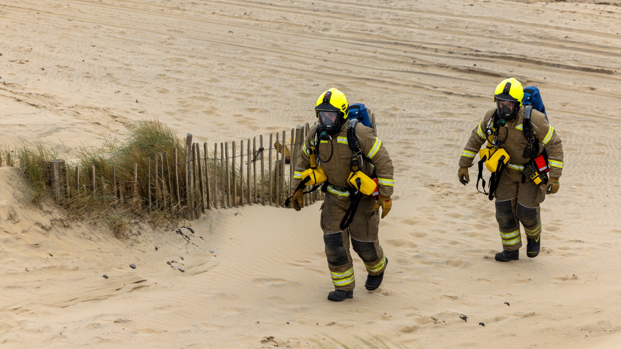 East Sussex Fire and Rescue personnel taking part in a simulated emergency exercise on Camber Sands in 2023