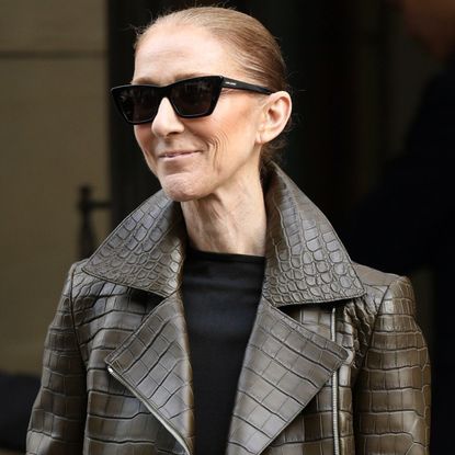 Céline Dion styled the Bermuda shorts trend for fall with a croc-embossed leather jacket and matching boots