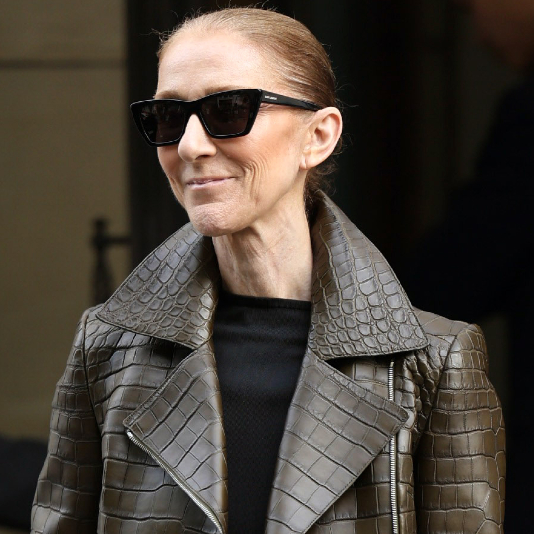 C&eacute;line Dion styled the Bermuda shorts trend for fall with a croc-embossed leather jacket and matching boots