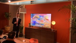 Amazon Fire Omni TV on an orange background