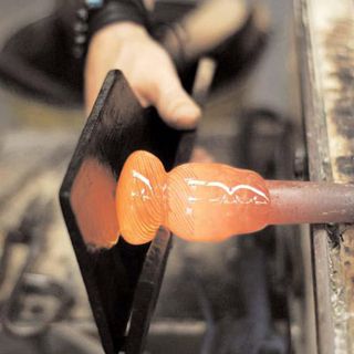 The blowing iron by the master glassmaker