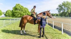 H&H&rsquo;s current showing editor Alex Robinson carrying out an interview at Royal Windsor Horse Show in 2022.