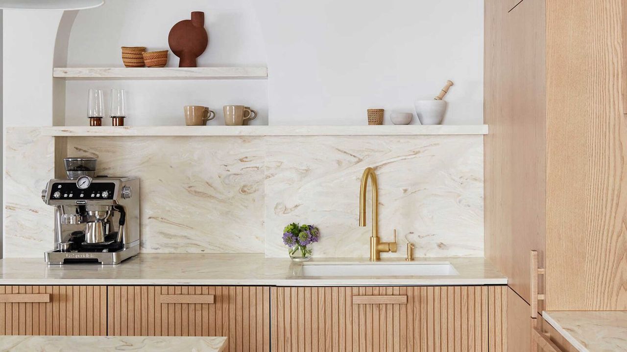 a kitchen with a corian countertop