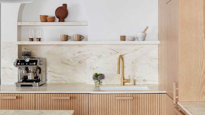 a kitchen with a corian countertop