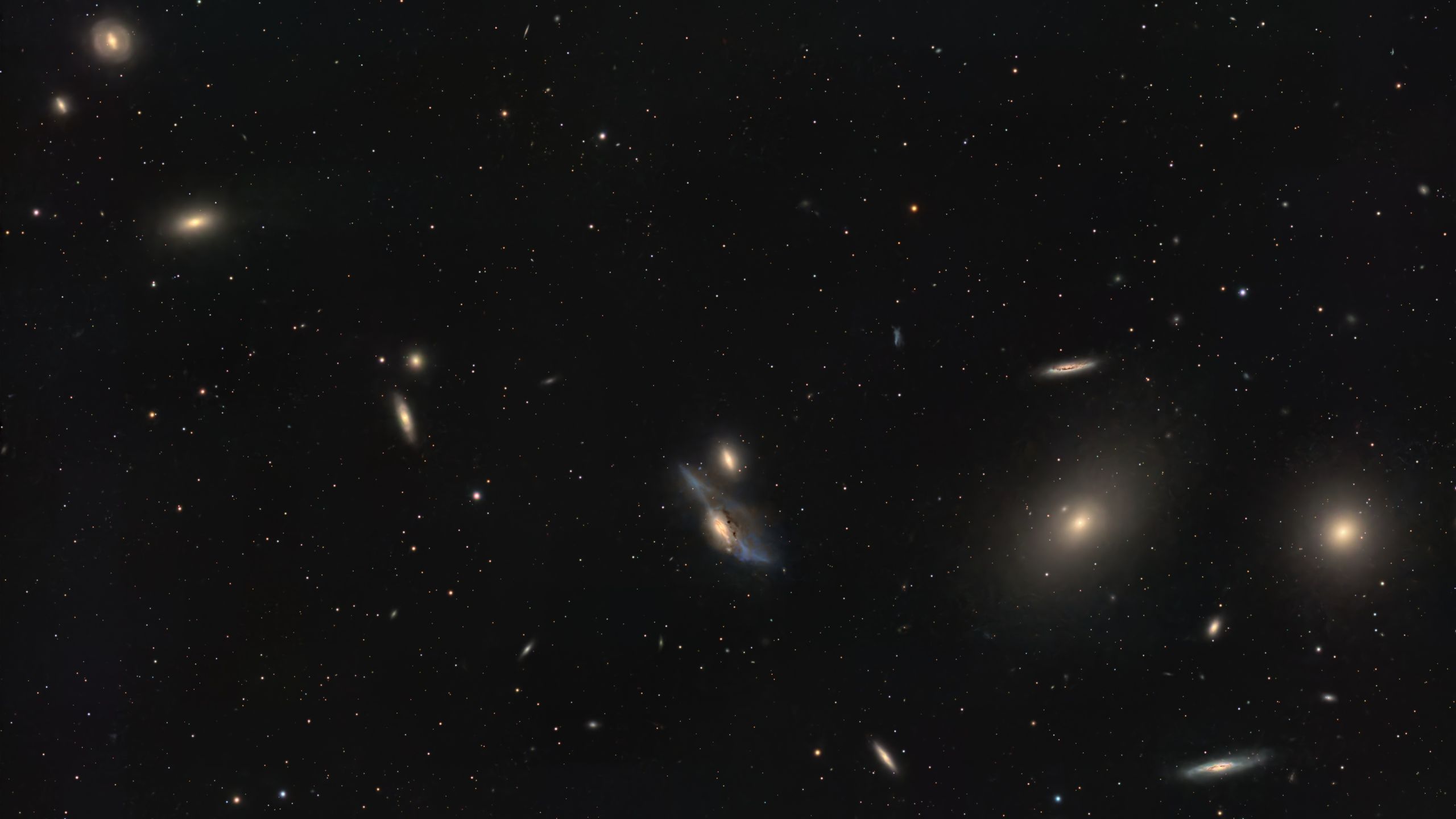 Unveiling the Virgo Cluster's 'Galactic Eyes' Through a Backyard Telescope