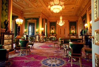 A carpeted red, gold room in Windsor Castle
